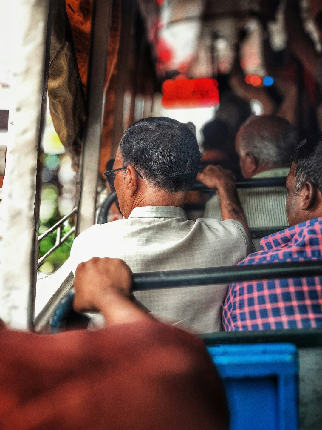 Group of seniors riding a tour bus together