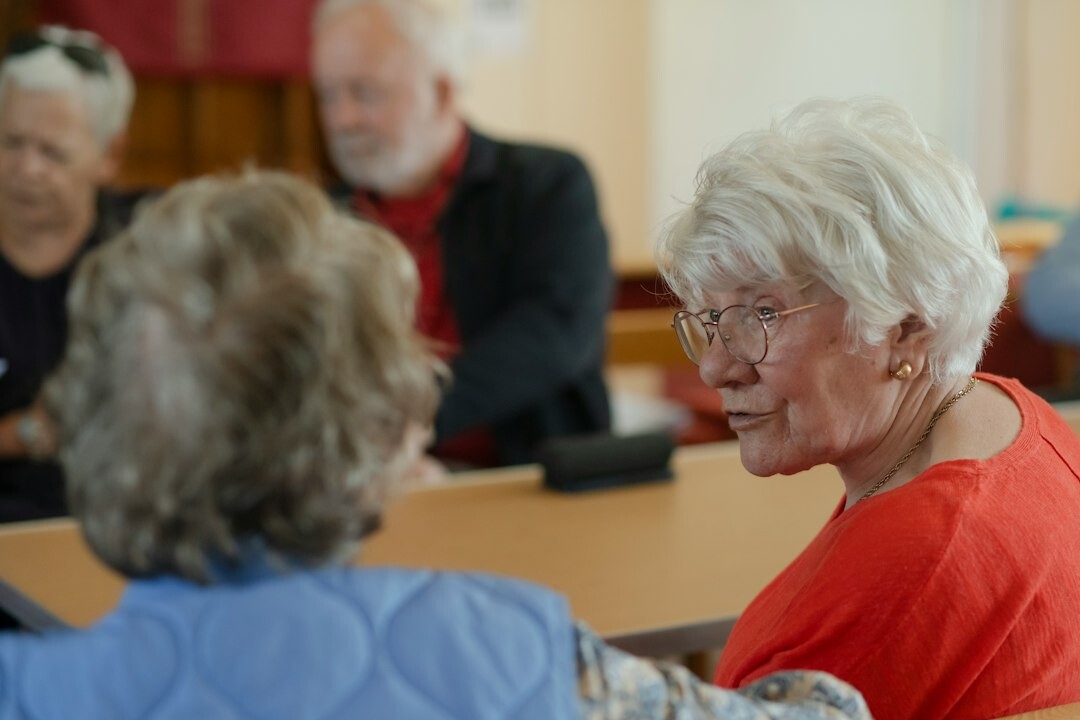 elderly people chatting in group