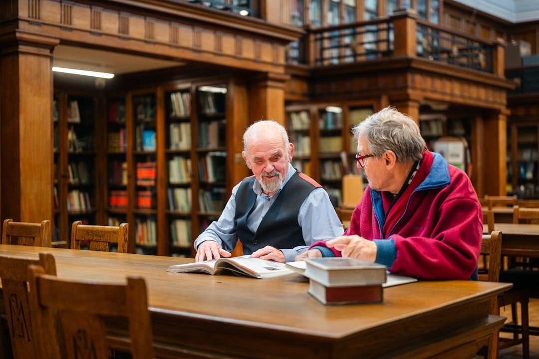 seniors reading books together