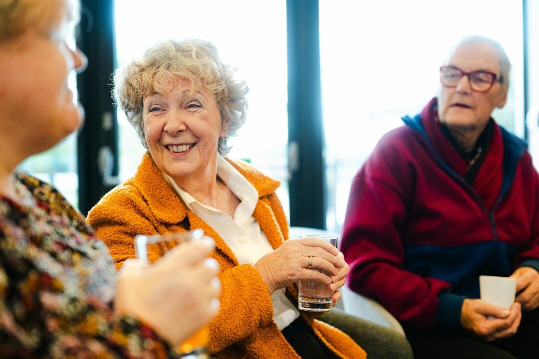 group of elderly friends chatting